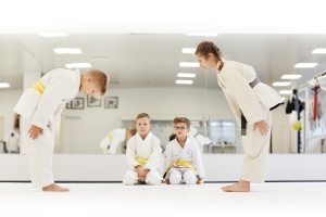 Children greeting each other before fight